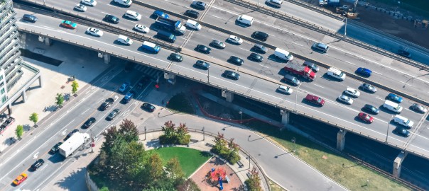 A high angle shot of a highway full of cars captured in Toronto, Canada